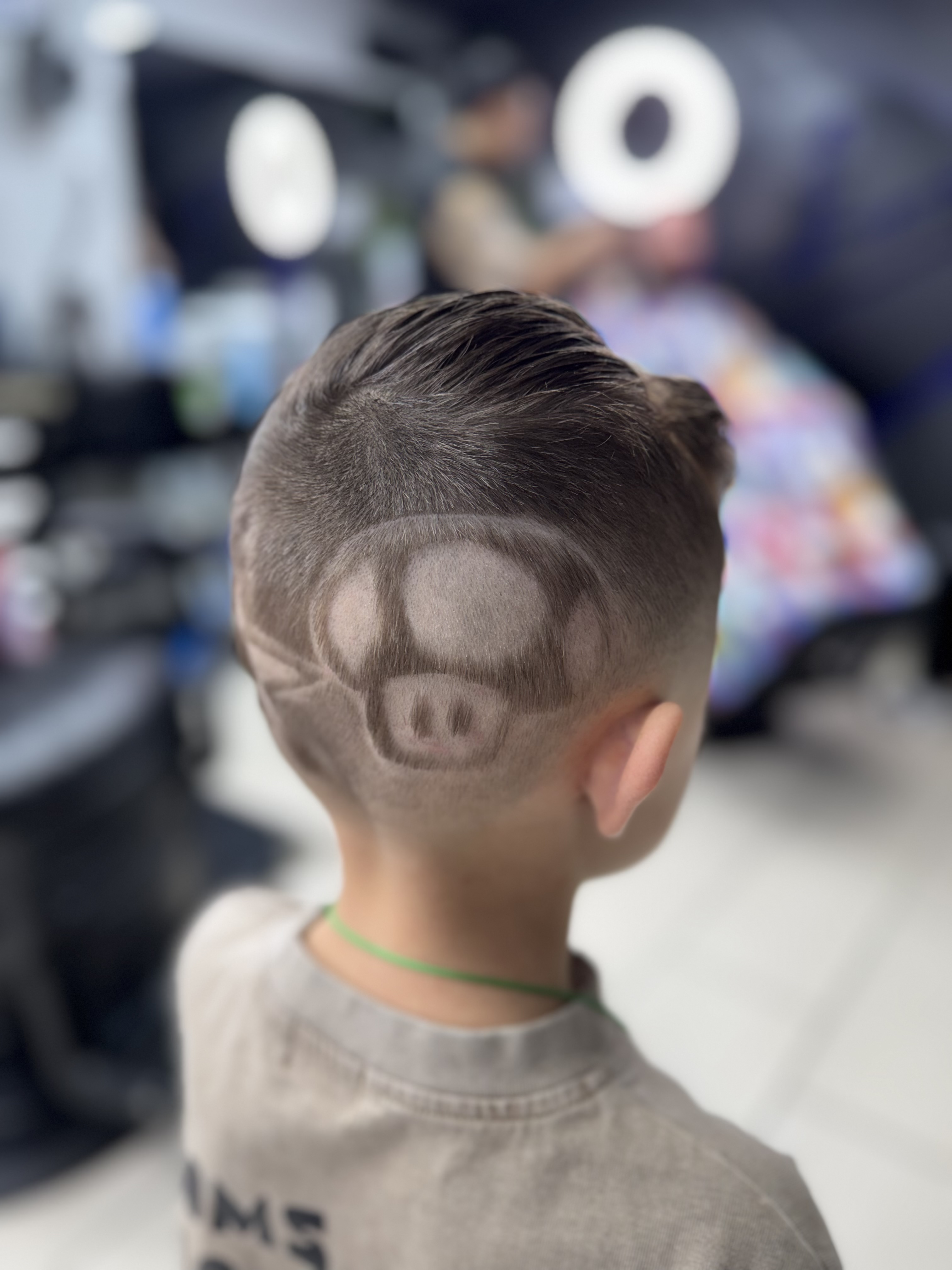 Creative pig design shaved into hair